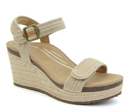 Beige wedge sandal with jute wrapped platform and ankle strap.