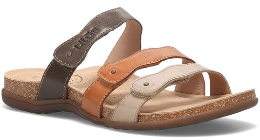 Sandal with multiple straps in brown, beige, and tan with the word "Taos" embossed on one strap.