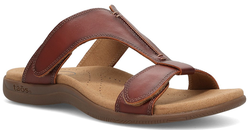 Brown leather sandal with adjustable straps and molded footbed.