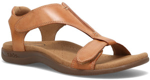 A tan sandal with hook and loop closure