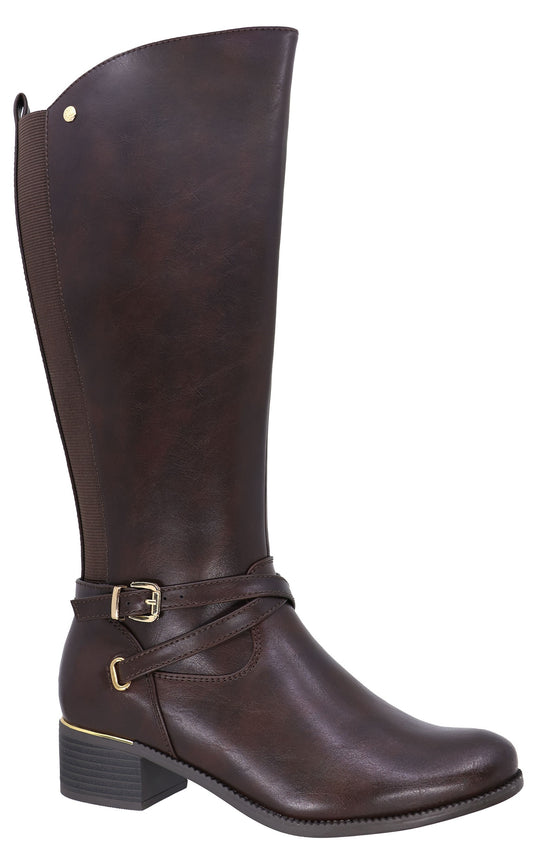 A dark brown knee-high leather boot with a low block heel, featuring a wrap-around strap with a gold-toned buckle at the ankle and a small gold-toned metal accent on the side of the heel.