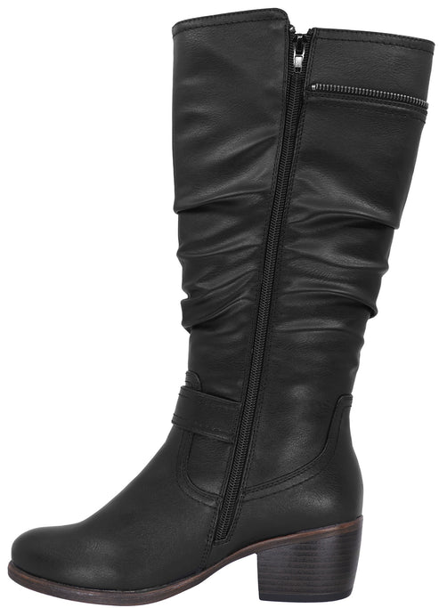 A black, knee-high, synthetic leather boot with a ruched shaft, a full side zipper, a decorative buckled strap at the ankle, and a low block heel.