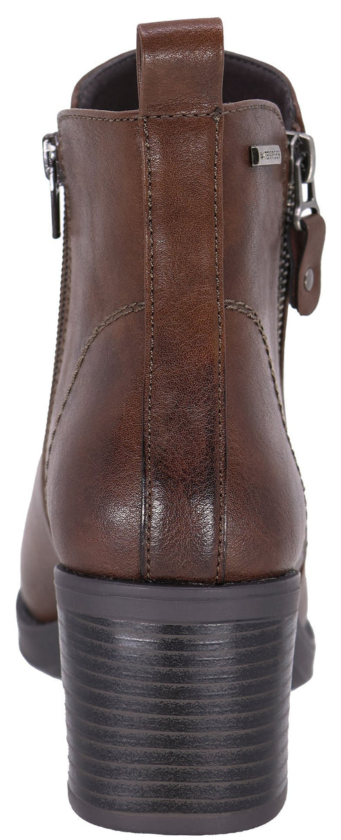A close-up back view of a dark brown leather ankle boot with a block heel, featuring a vertical seam down the center back, a heel pull tab, and two side zippers.