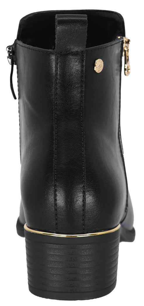 Rear view of a black ankle boot with a low block heel, a gold-tone trim detail at the heel base, a back pull tab, and a small circular gold emblem on the upper heel shaft.