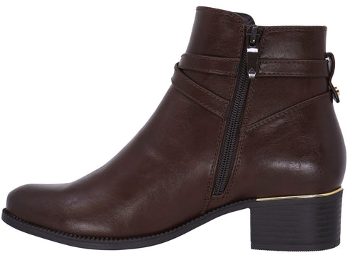A brown faux leather ankle boot with a low block heel, side zipper closure, and decorative wrap-around ankle straps.