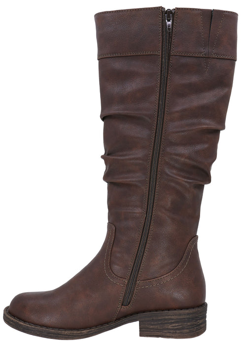 A brown, knee-high boot made of a matte, leather-like material, featuring a side zipper closure, a slightly slouchy shaft design, and a low, stacked block heel.