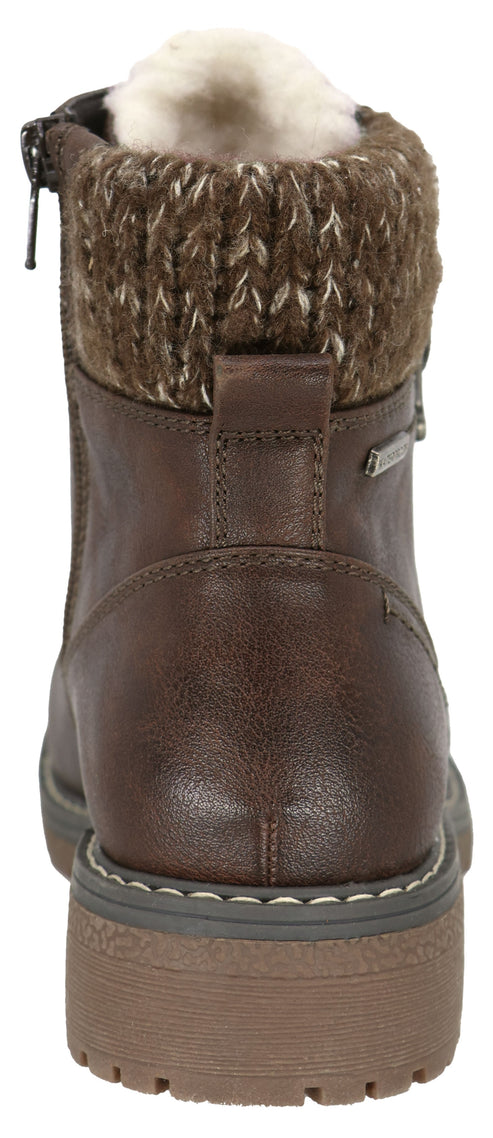 A back view of a dark brown ankle boot with a fuzzy white faux fur lining, a cable-knit sweater-style cuff, a side zipper, and a thick, lugged brown rubber sole.