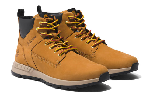 Pair of mid-rise brown Timberland boots with yellow laces and a black padded collar.
