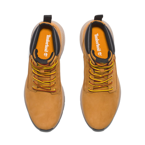 Overhead view of two wheat nubuck leather sneaker boots with black trim and multi-colored laces.