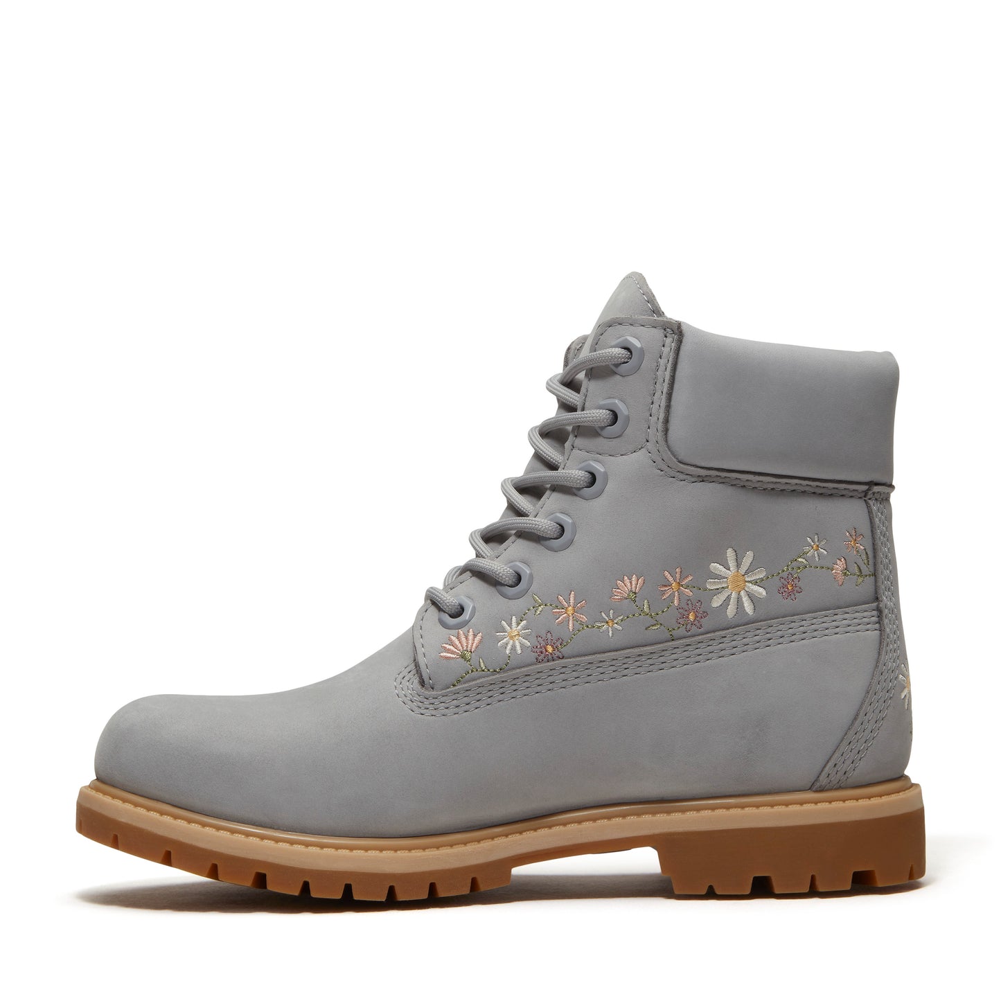 A gray boot with flower embroidery.