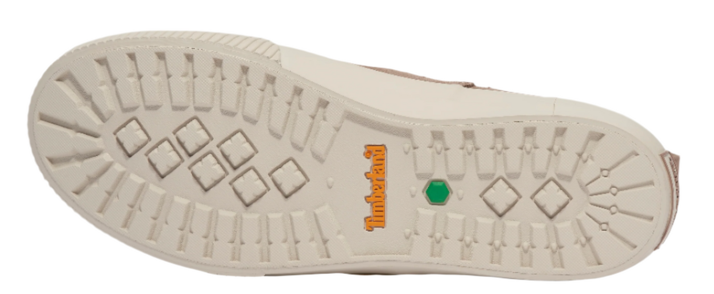 A shoe sole with rectangular and diamond treads, and an orange "Timberland" logo with a green dot.