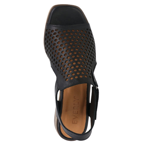 Overhead view of a black peep-toe sandal with a cutout pattern and "EVERLY" printed on the inner sole.