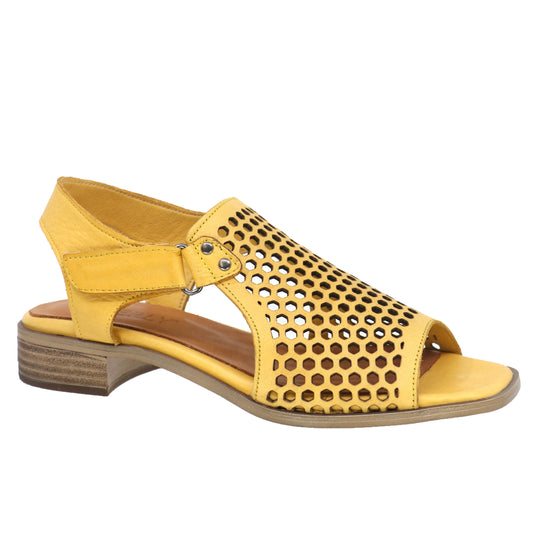 Yellow sandal with punched holes and an ankle strap.