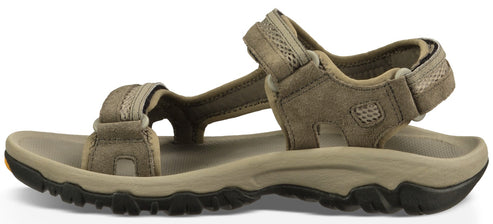 A taupe suede-like sandal with tan sole and black traction tread.