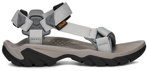 A gray sandal with black soles.