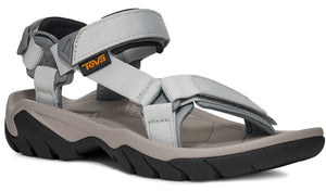 Light grey sandal with hook and loop straps and a black and grey sole.