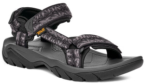 Black and grey patterned sandal with adjustable straps and thick sole.