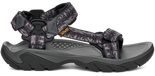 A sandal with a gray and black patterned strap.