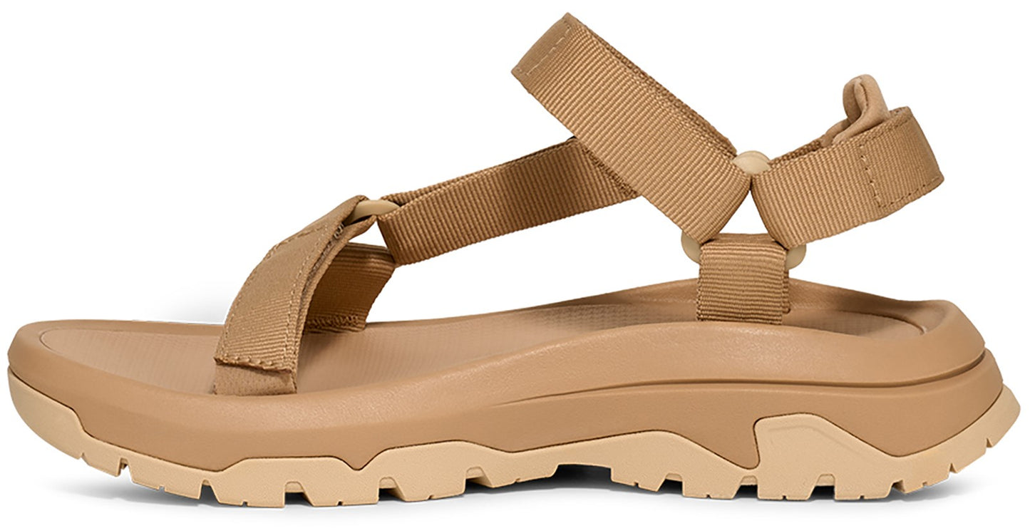 Tan colored chunky soled sandal with tan straps.