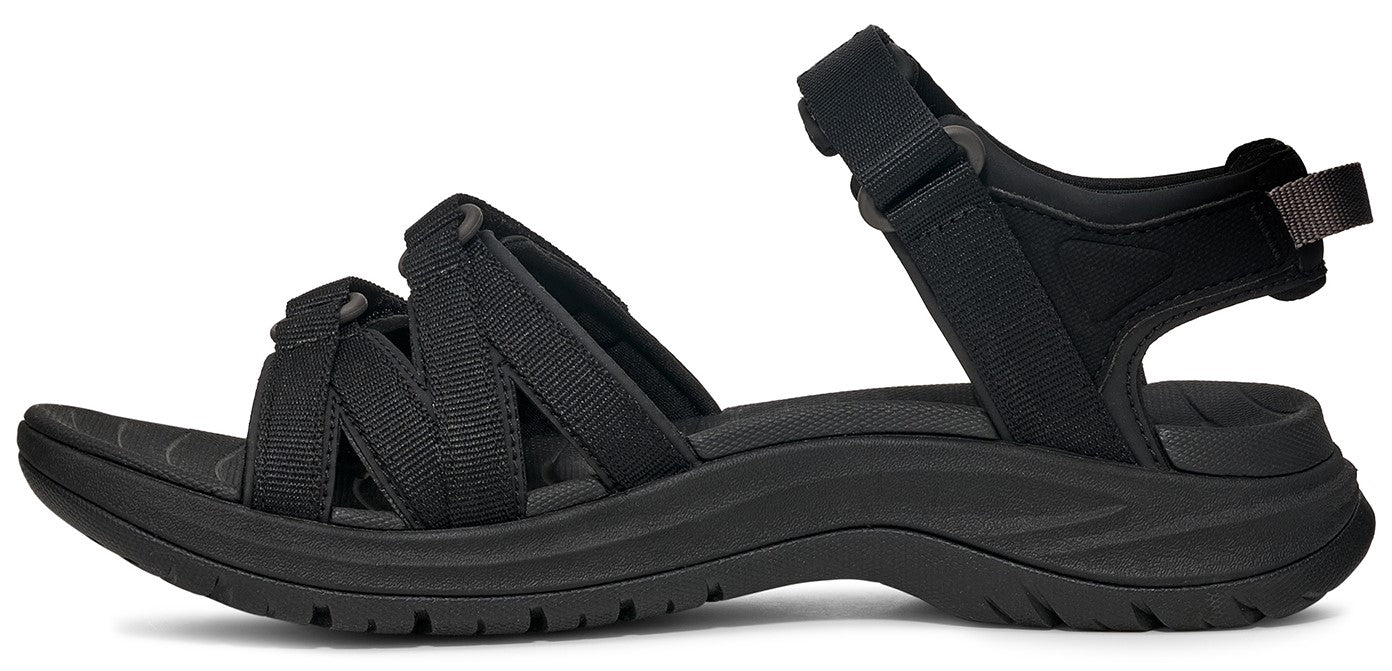 A black sandal with straps and a thick sole.