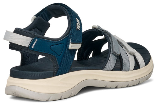 Navy and gray sandal with adjustable straps and a thick, tan sole.