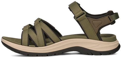 A sandal with green straps and a tan sole.