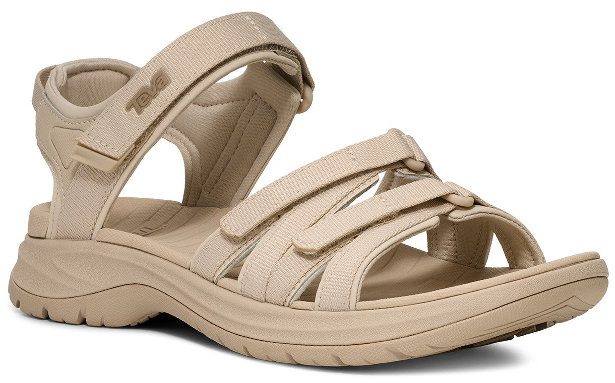 Beige sandal with adjustable straps.