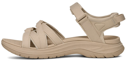 Beige sandal with multiple straps across the top of the foot and an ankle strap.