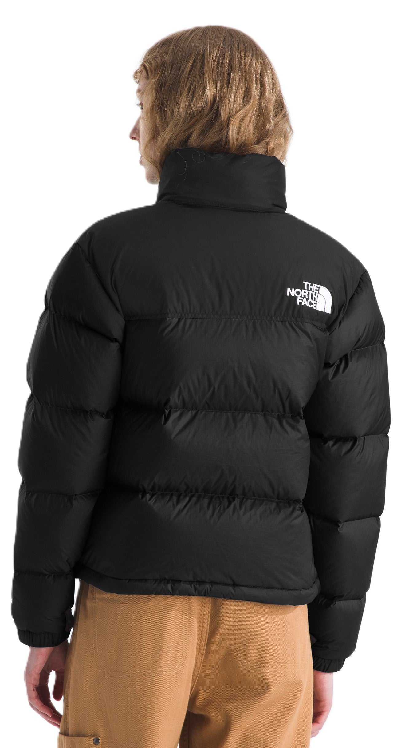 Black puffer jacket with logo on shoulder.