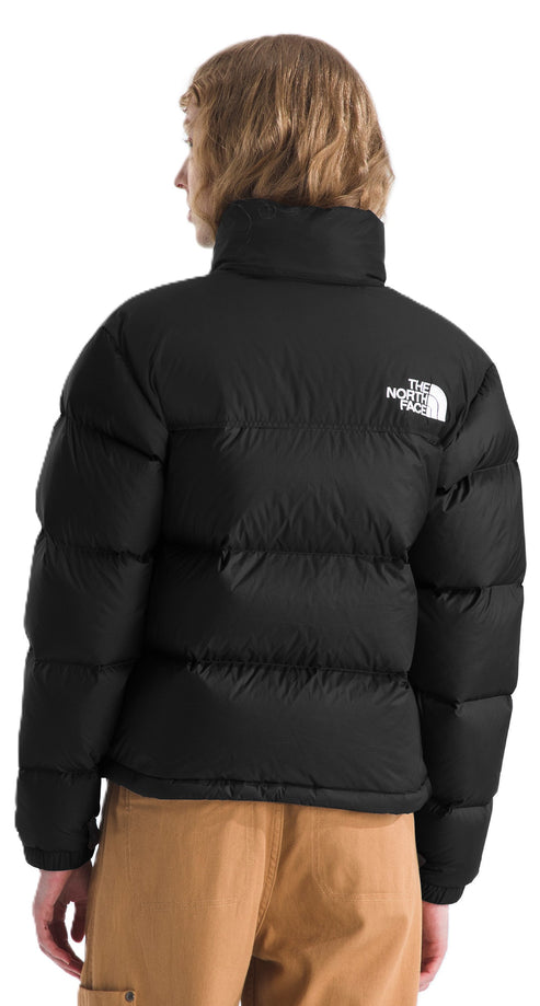 Black puffer jacket with logo on shoulder.