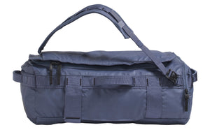 Blue duffel bag with shoulder strap and handles.