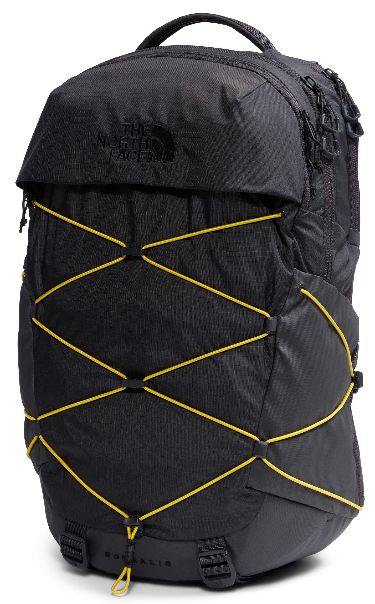 A black backpack with a top handle and a large front pocket, featuring a prominent yellow bungee cord lacing system across the front, with the text 'THE NORTH FACE' subtly embossed on the top flap.