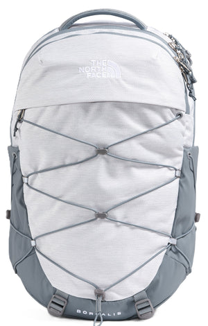 Backpack in white and gray with crisscross bungee cords.