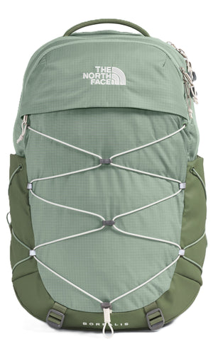 Green backpack with white crisscross cords.