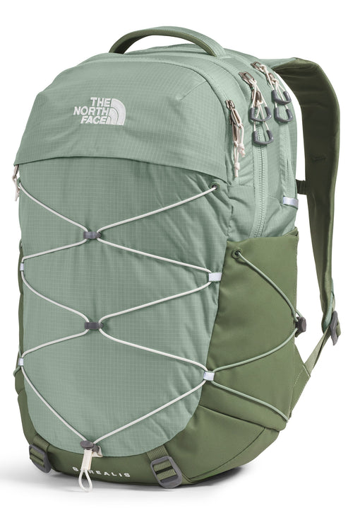Backpack with light green top, olive green bottom, a white logo on top and white bungee cords.