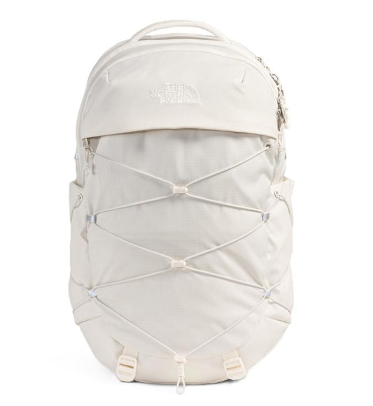 A white backpack with a bungee cord system on the front and a top handle.