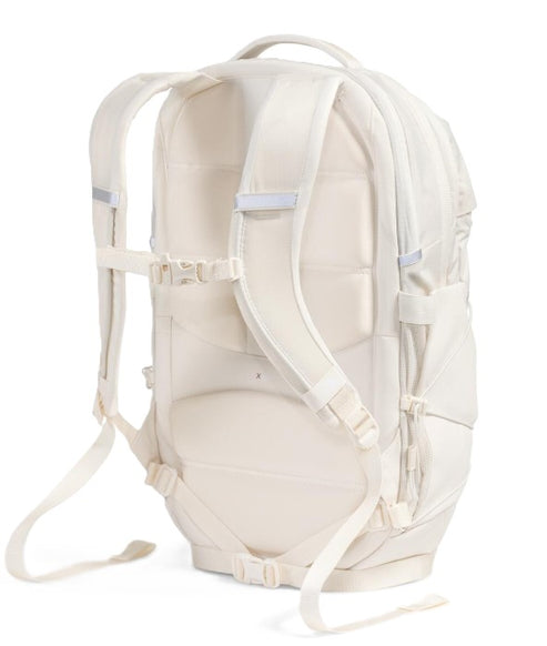 White backpack with shoulder straps, sternum strap, and padded back panel.