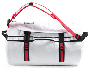 White duffel bag with red straps and black accents.