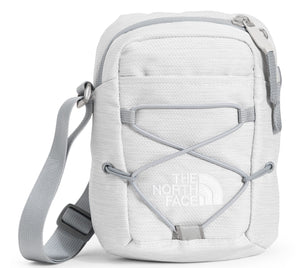 White crossbody bag with gray strap, criss-cross cords, and North Face logo.