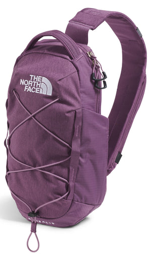 Purple sling pack with white text, front bungee cord and top handle.