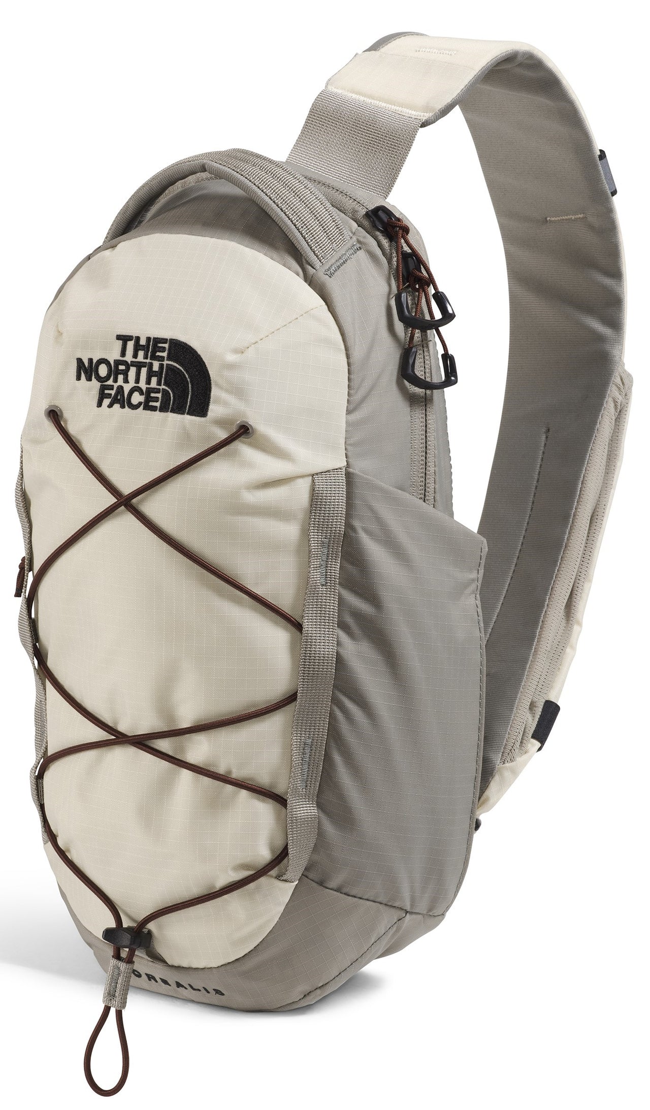 A gray and white shoulder bag with black elastic cords crisscrossing on the front and THE NORTH FACE logo.