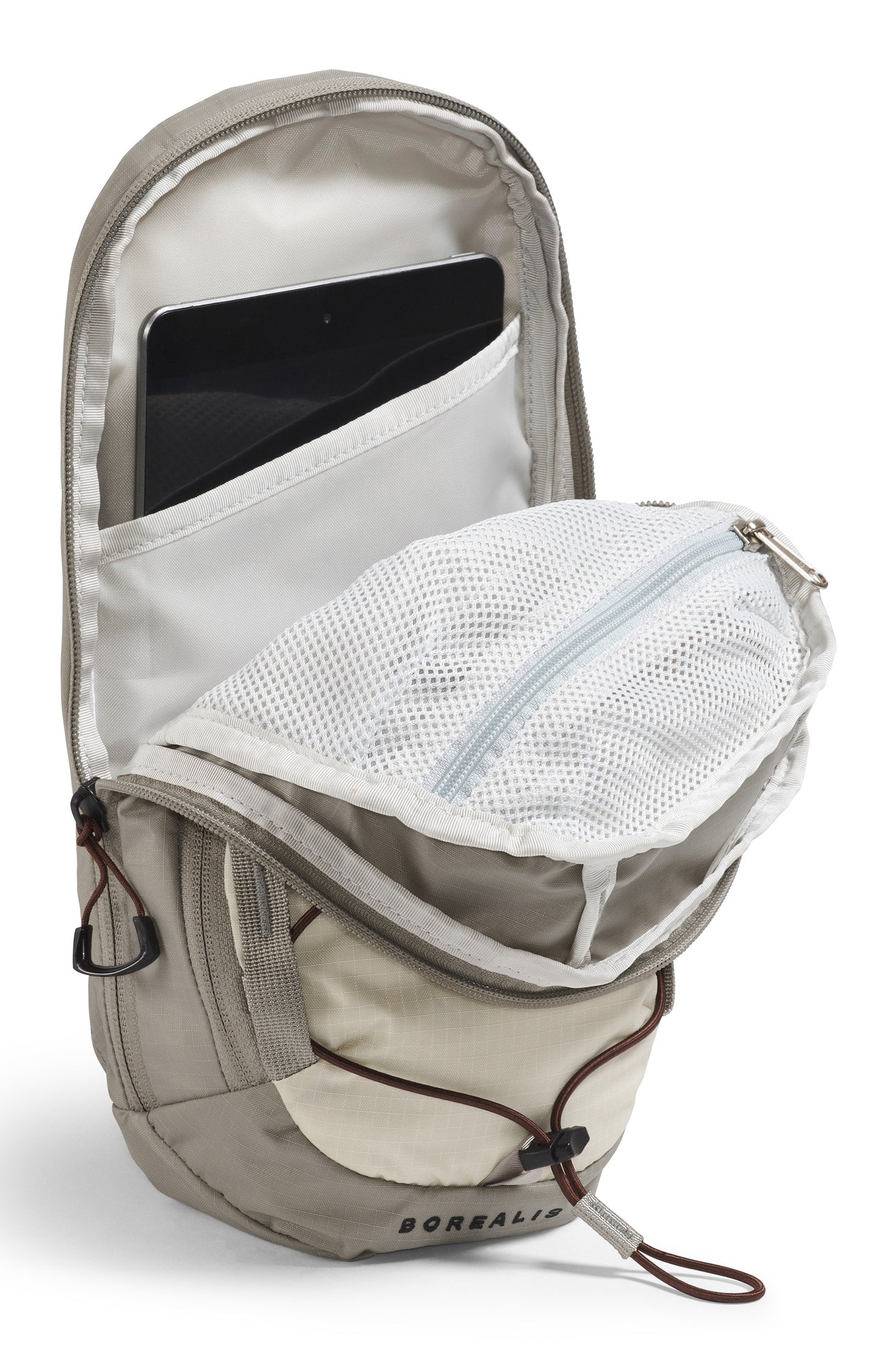 Open gray backpack with mesh pocket, interior tablet sleeve, and visible text 'BOREALIS'.