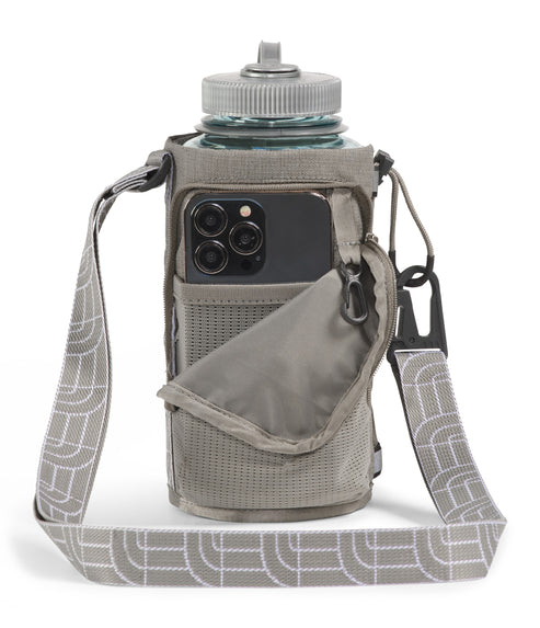 Gray water bottle holder with crossbody strap featuring a gray water bottle and black phone in pocket.