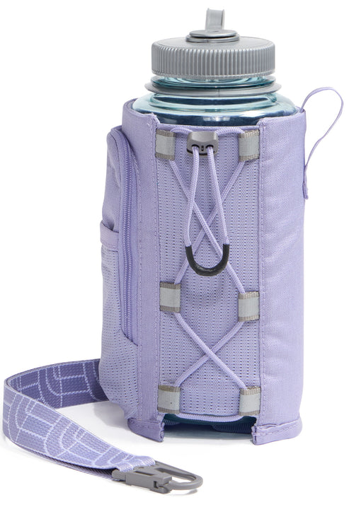 A light purple, insulated water bottle carrier with a bungee cord lacing system on the front, a zippered side pocket, and a detachable, patterned light purple strap with a gray carabiner clip.