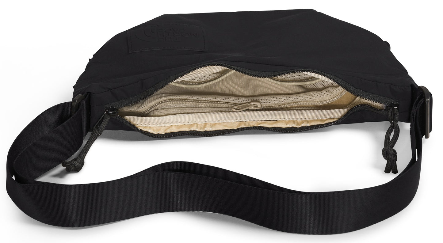 Open black messenger bag with adjustable black strap revealing mesh pockets.