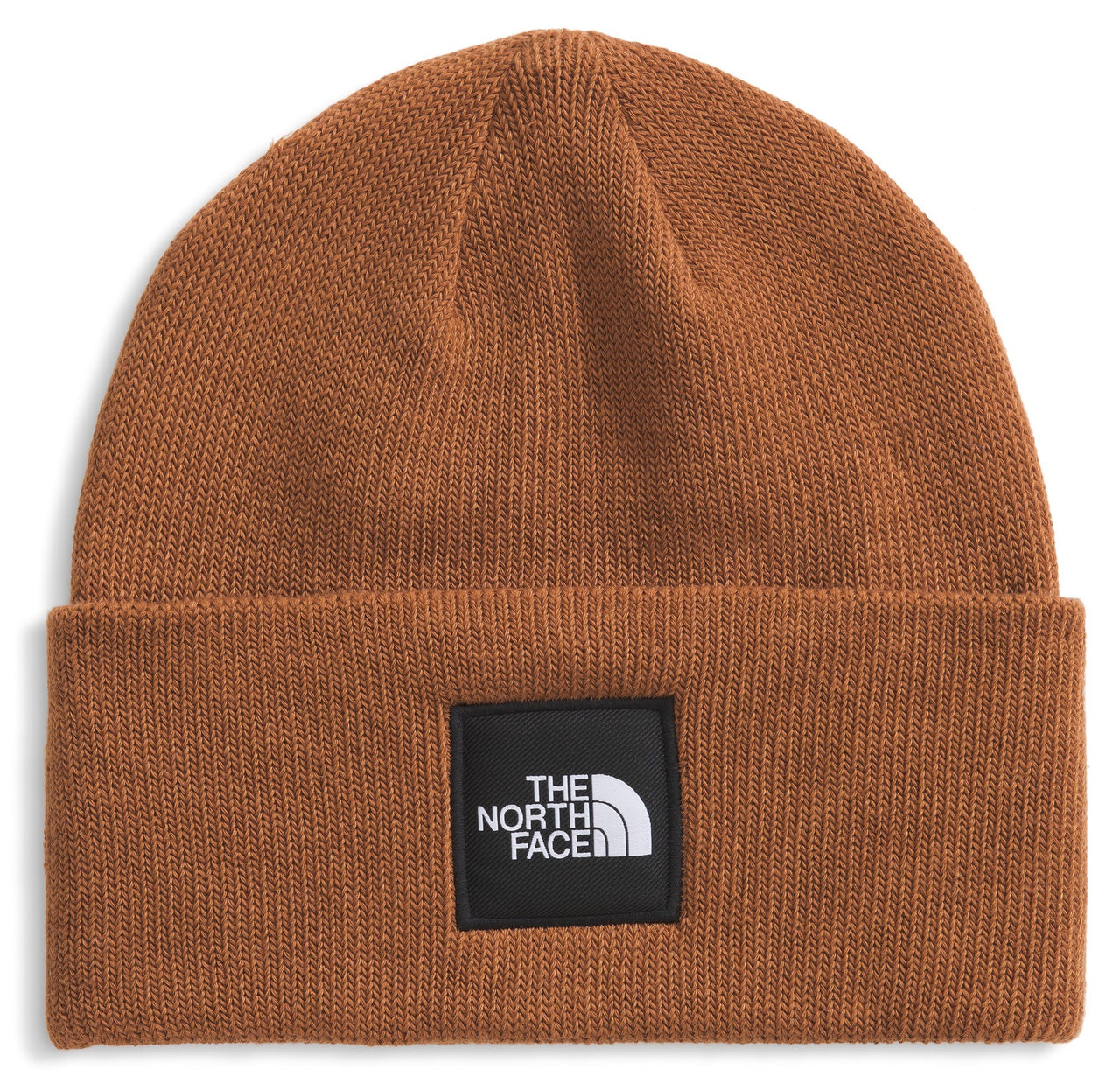 A brown beanie hat with a black square label on the front with white text.