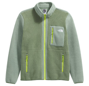 Green fleece jacket with yellow zippers and chest pocket.