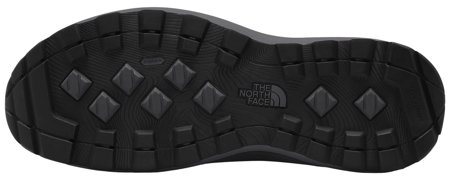 A black shoe sole with a diamond pattern and the logo of The North Face.