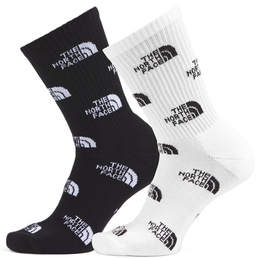 Pair of socks, one black and one white, each patterned with "THE NORTH FACE" text.