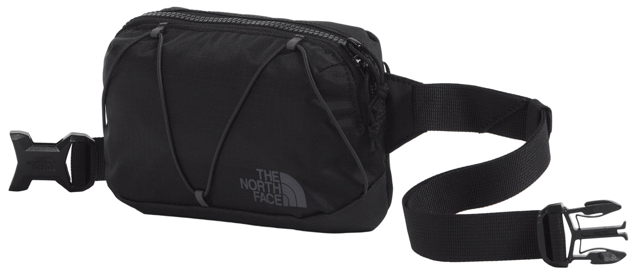 A black fanny pack with an adjustable strap and buckle closure.